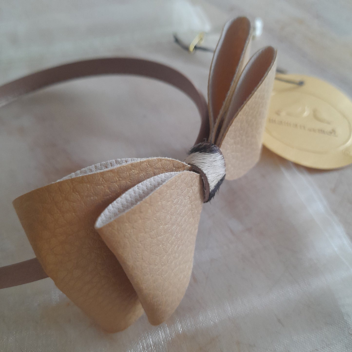 Cerchietto Margot con fiocco in ecopelle e cavallino